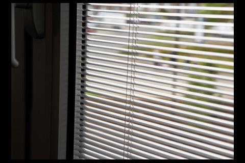 Blinds between the double glazing allow occupants to open the windows and still control glare